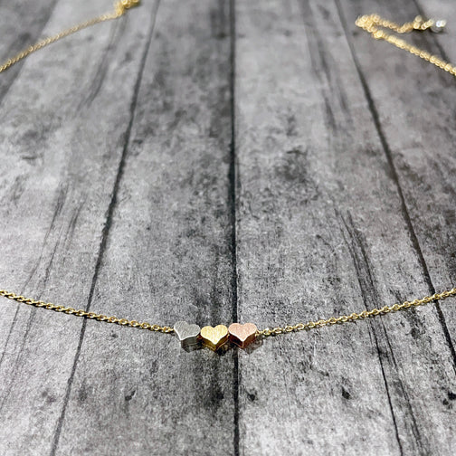 Metal heart store necklace